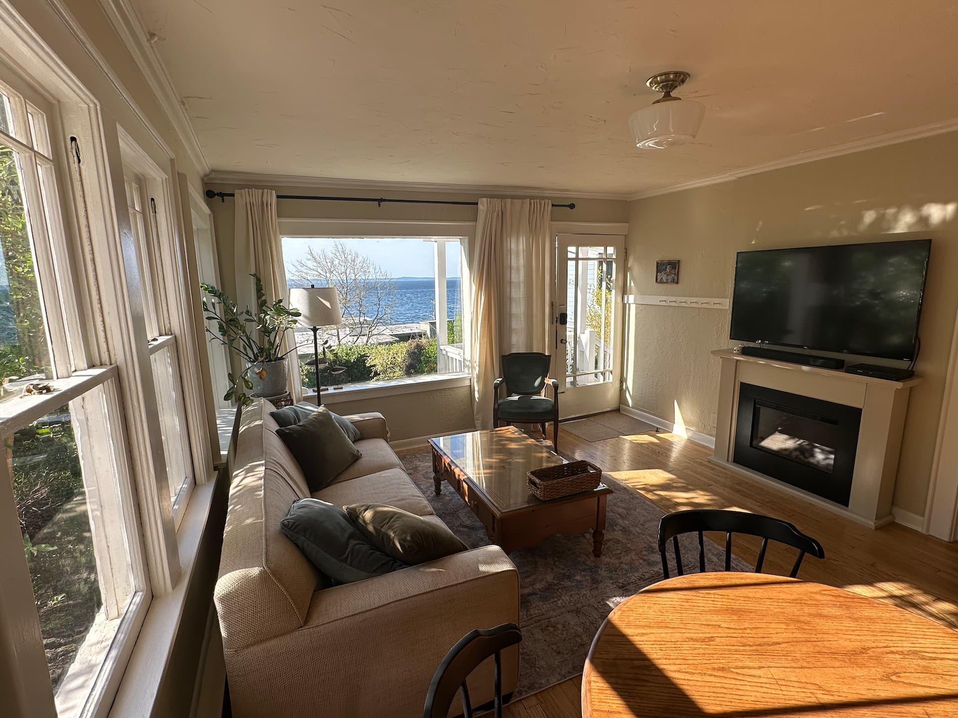Living room with Puget Sound views at The Alki Retreat